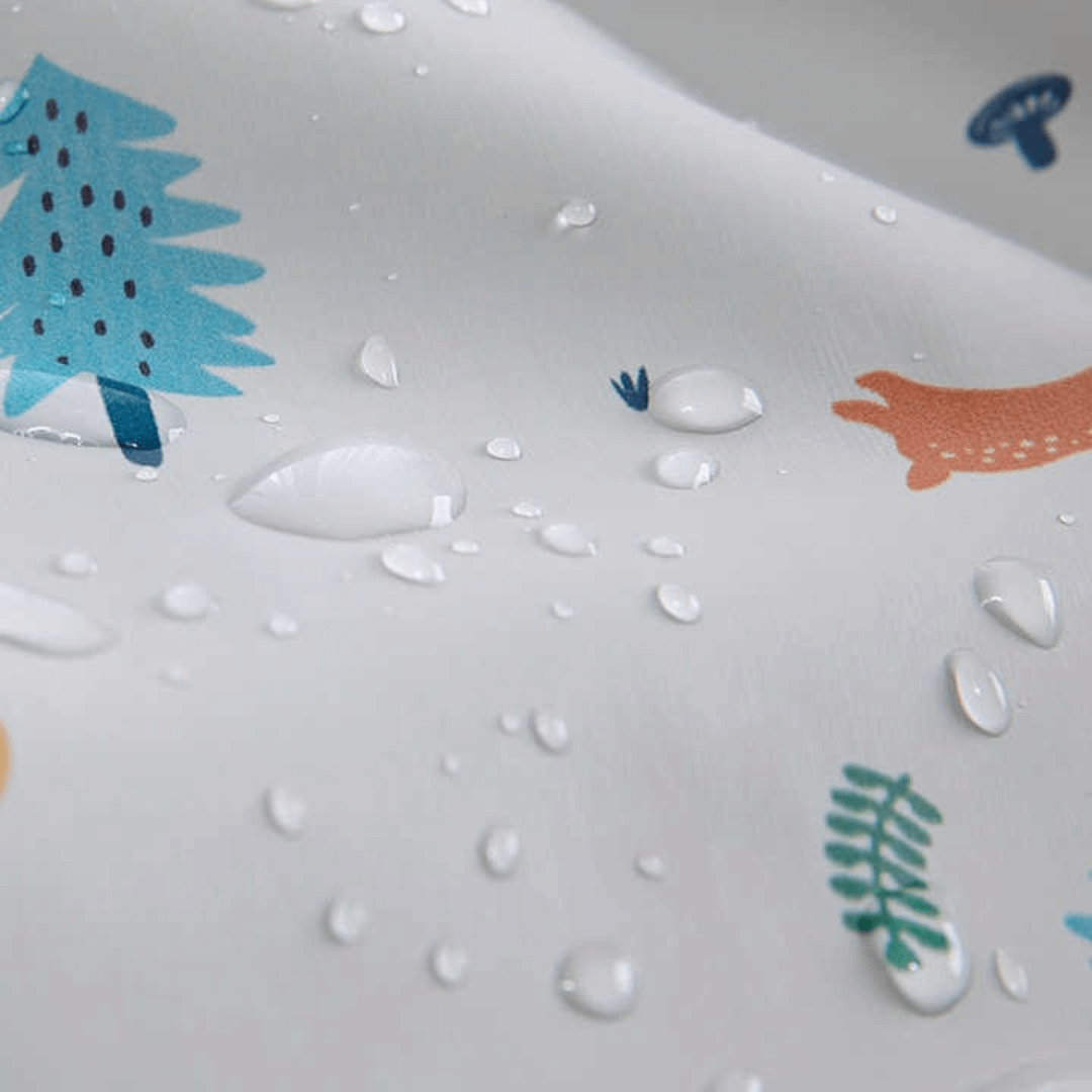 Babero impermeable con mangas